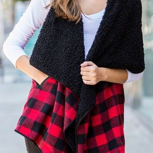 Plaid Fur Lined Cozy Soft Vest With Pockets And Wide Notched Collar.
Open Front.